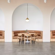 Arched seating niches feature in Goop headquarters designed by Rapt Studio