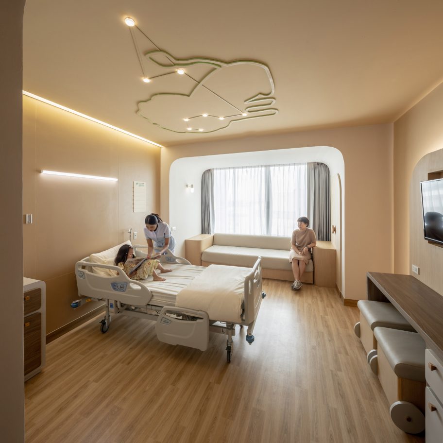 Children's hospital room with lion ceiling light by Integrated Field