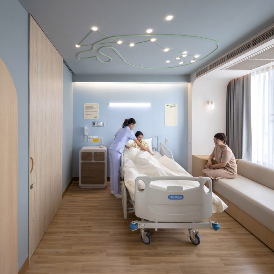 Children's hospital room with whale ceiling light by Integrated Field