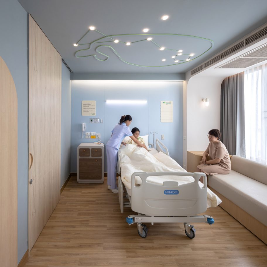 Children's hospital room with whale ceiling light by Integrated Field