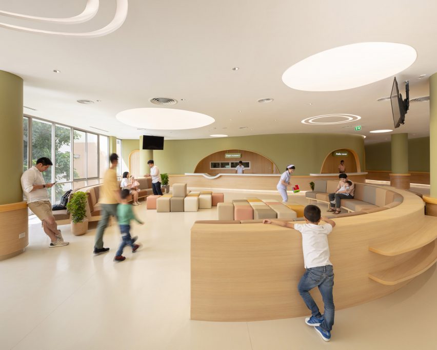 pharmacy with soft play area in children's hospital by Integrated Field