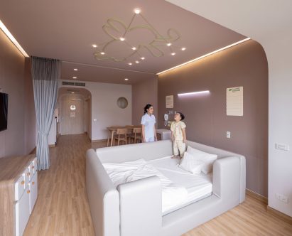 Children's hospital room with rabbit ceiling light by Integrated Field