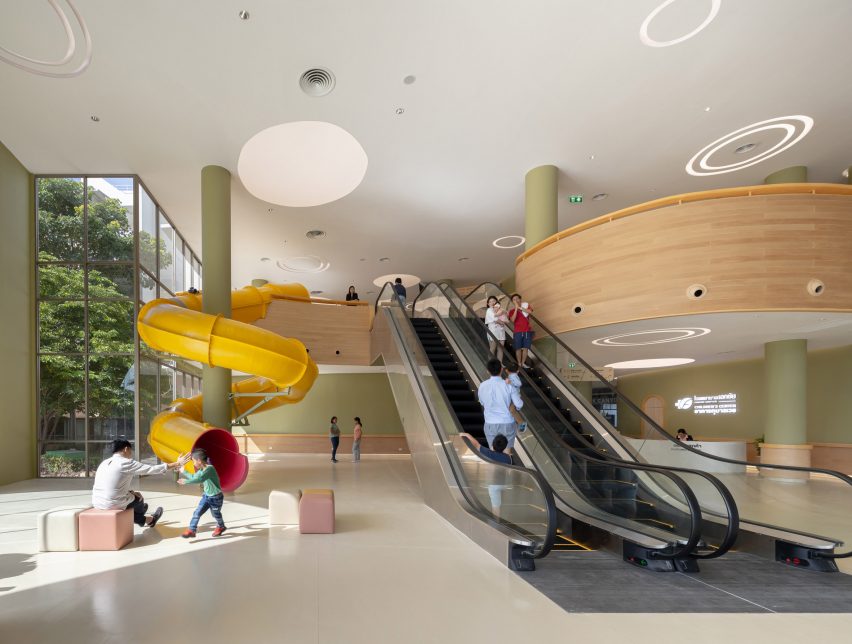 Yllow spiral slide in waiting room of children's hospital