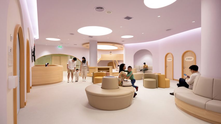 Pink waiting room in children's hospital designed by Integrated Field