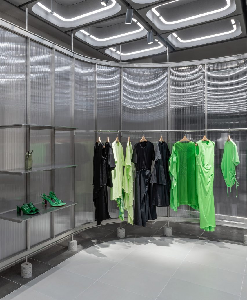 Interiors of JNBY store in Xiamen, China feature concrete, steel and glass