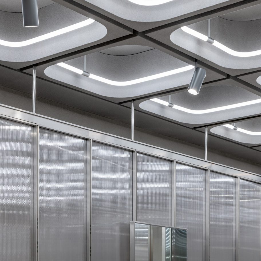 Interiors of JNBY store in Xiamen, China feature concrete, steel and glass