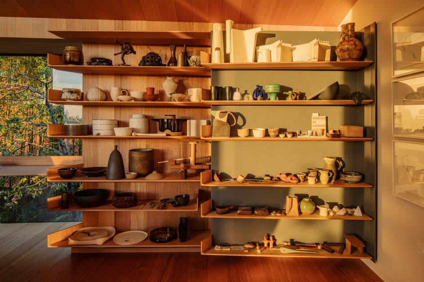 Shelf of ceramics in Kew Residence by John Wardle Architects in Melbourne, Australia