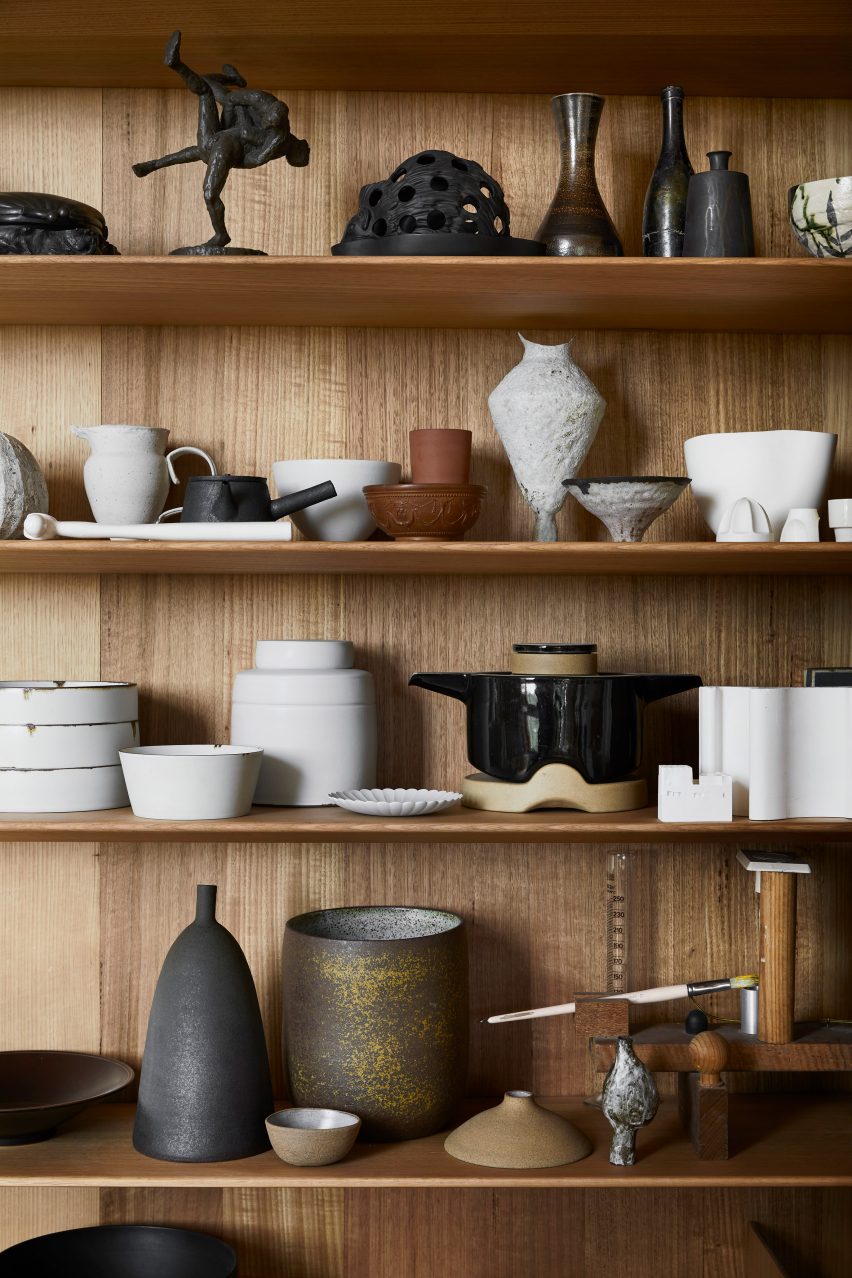 Shelf of ceramics in Kew Residence by John Wardle Architects in Melbourne, Australia