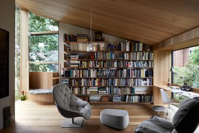 Study lined with wood in Kew Residence by John Wardle Architects in Melbourne, Australia