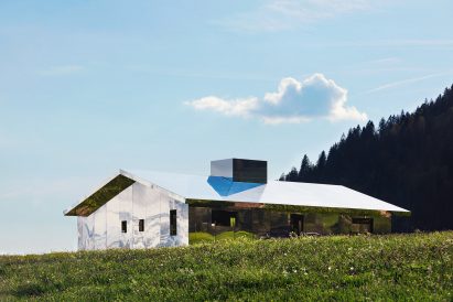 Mirage Gstaad mirrored building art installation by Doug Aitken in Switzerland in summer