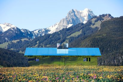 Mirage Gstaad mirrored building art installation by Doug Aitken in Switzerland in spring
