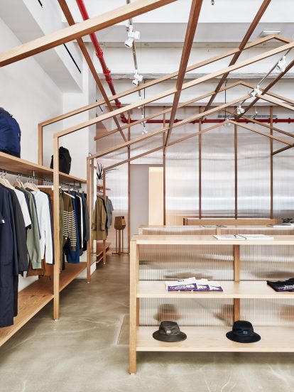 Shelving in Nanamica store by Taichi Kuma