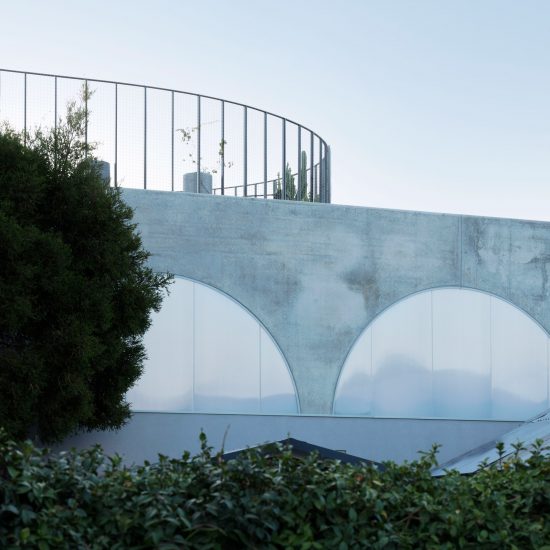Arched precast concrete panels form North Perth House by Nic Brunsdon