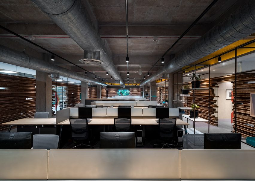 Desks in Walls of of Office in Cardboard by Studio VDGA in Pune, India