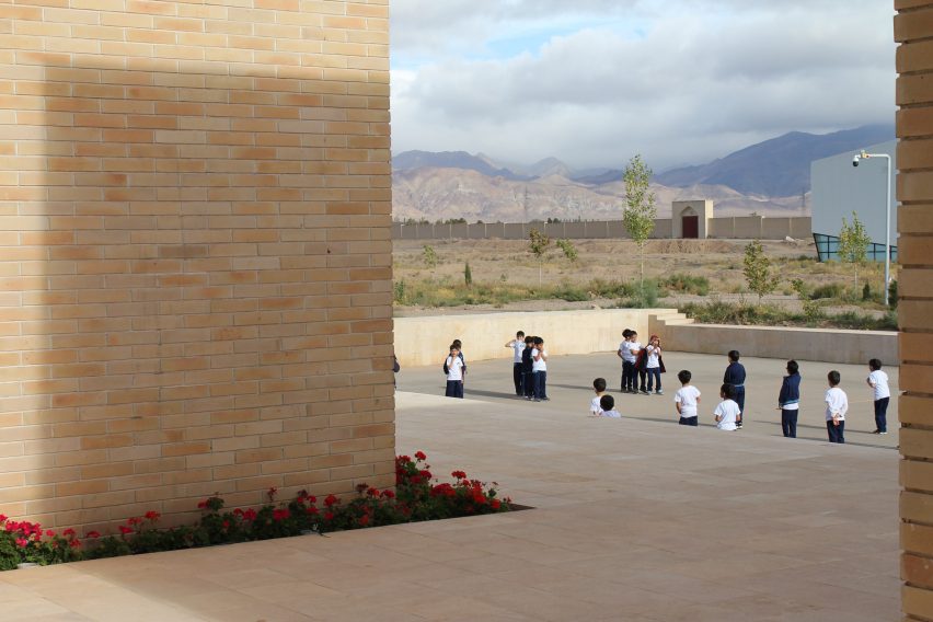 The Noor E Mobin G2 Primary School by FEA Studio made of brick in Iran