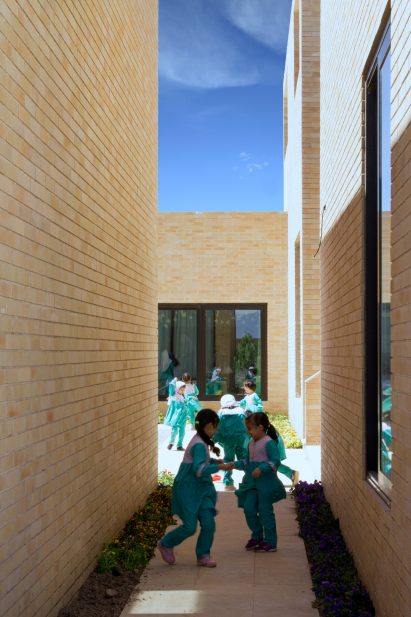 The Noor E Mobin G2 Primary School by FEA Studio made of brick in Iran