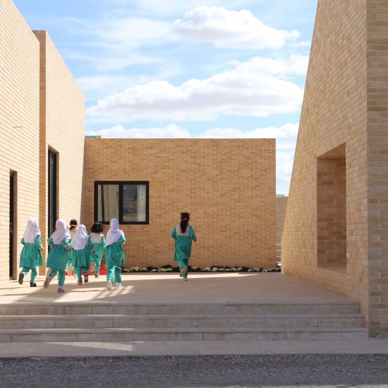 The Noor E Mobin G2 Primary School by FEA Studio made of brick in Iran