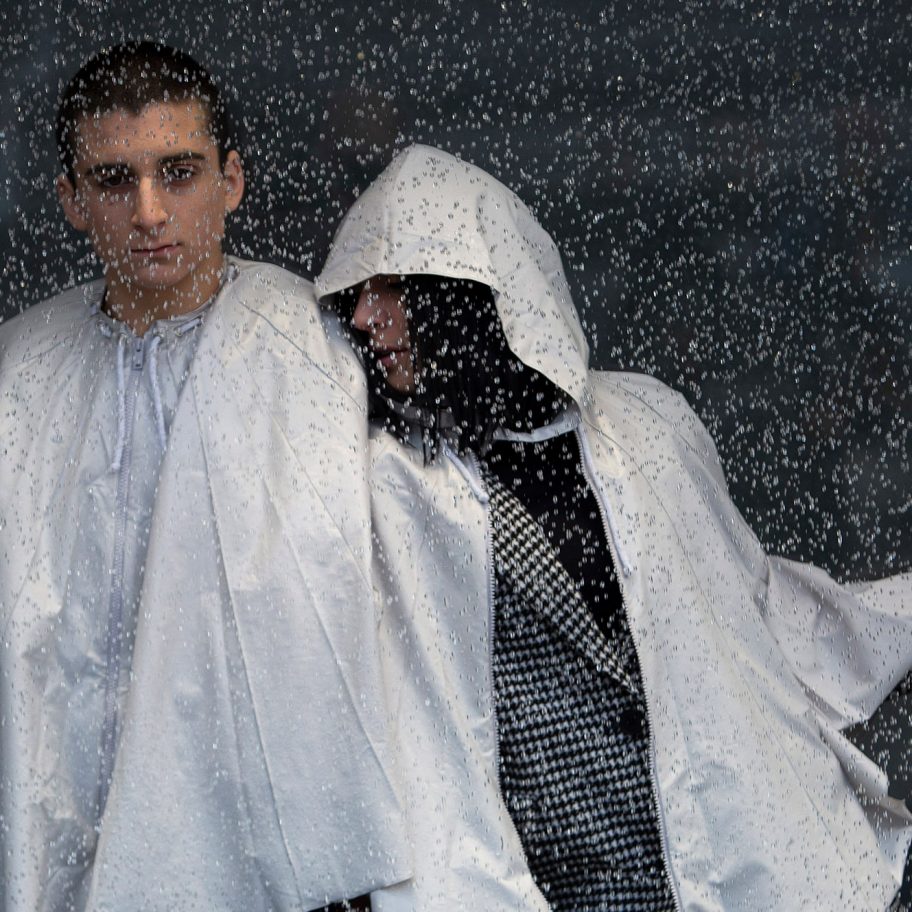 Urbanella is a rainproof cape that packs away into a handy bag