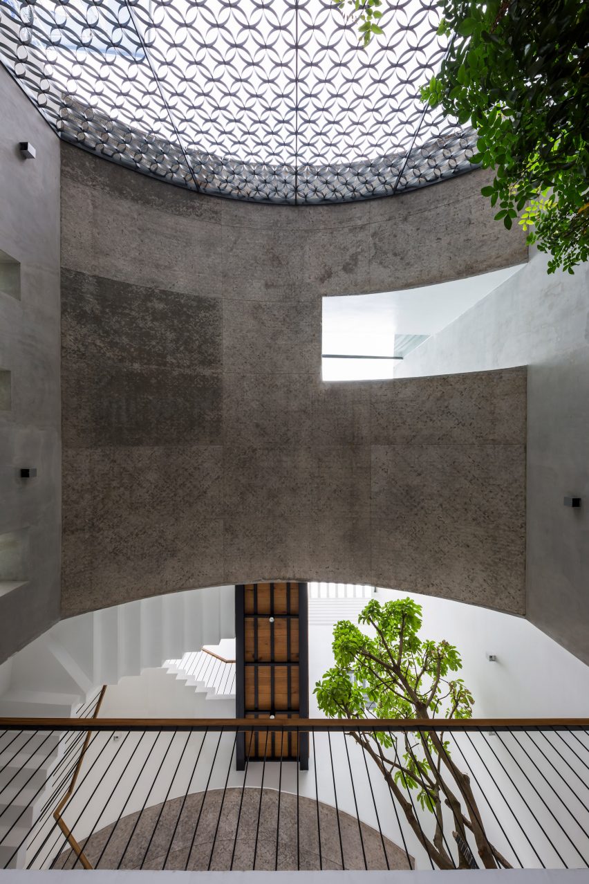 Concrete arch inside of Vom House in Vietnam by Sanuki Daisuke Architects