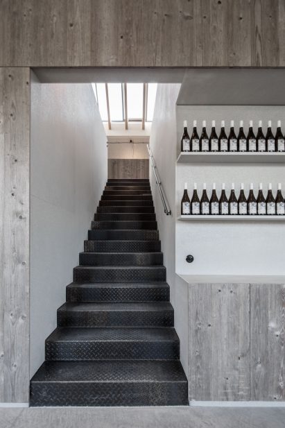 Clemens Strobl winery by Destilat features greyscale interiors