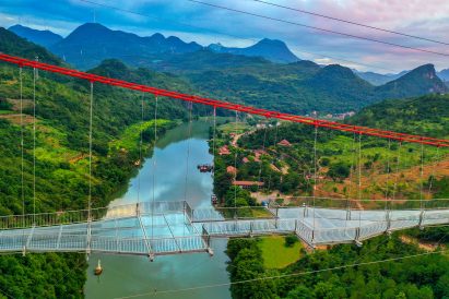 World's longest glass-bottomed bridge in Huangchuan Three Gorges Scenic Area in southern China