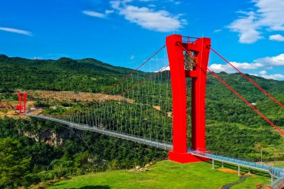 World's longest glass-bottomed bridge in Huangchuan Three Gorges Scenic Area in southern China