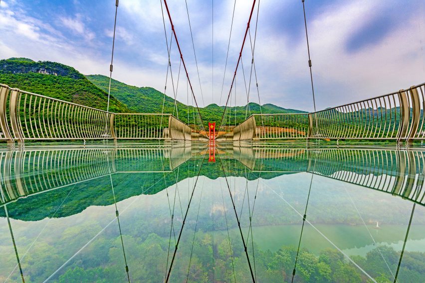 World's longest glass-bottomed bridge in Huangchuan Three Gorges Scenic Area in southern China