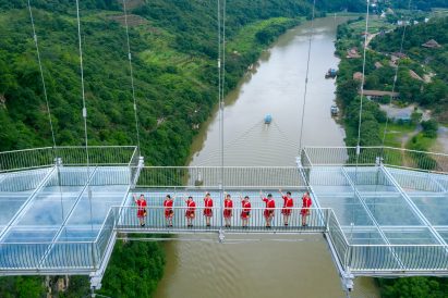 World's longest glass-bottomed bridge in Huangchuan Three Gorges Scenic Area in southern China