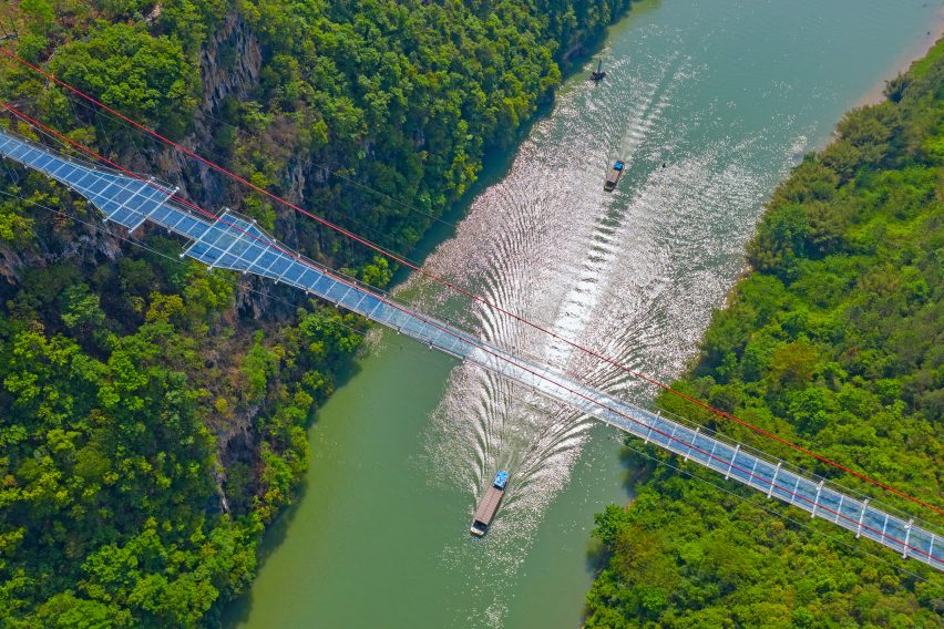 World's longest glass-bottomed bridge in Huangchuan Three Gorges Scenic Area in southern China