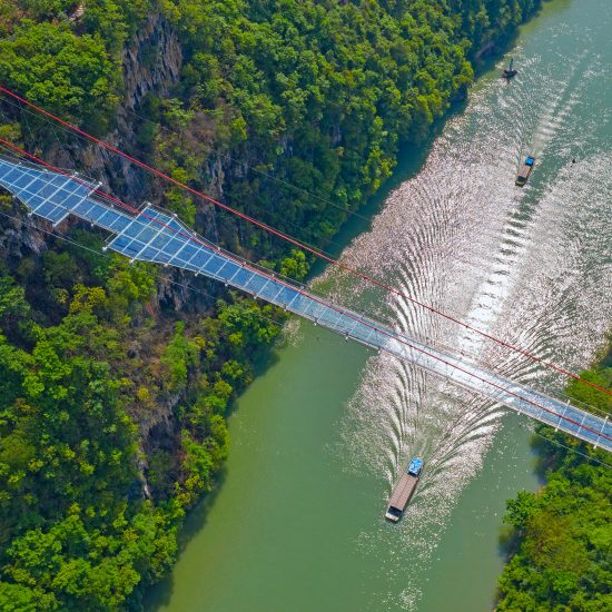 World's longest glass-bottomed bridge in Huangchuan Three Gorges Scenic Area in southern China