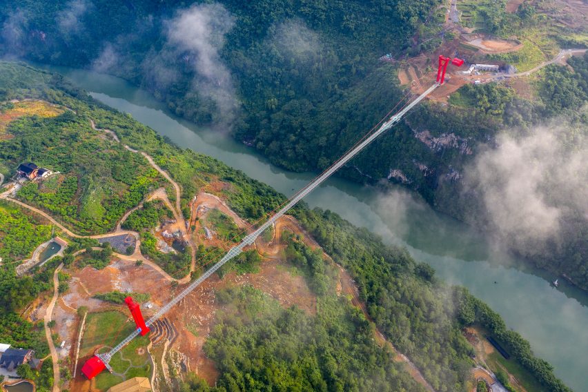 World's longest glass-bottomed bridge in Huangchuan Three Gorges Scenic Area in southern China