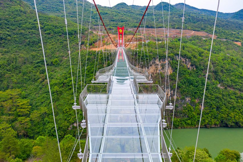 World's longest glass-bottomed bridge in Huangchuan Three Gorges Scenic Area in southern China