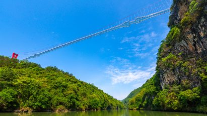 World's longest glass-bottomed bridge in Huangchuan Three Gorges Scenic Area in southern China