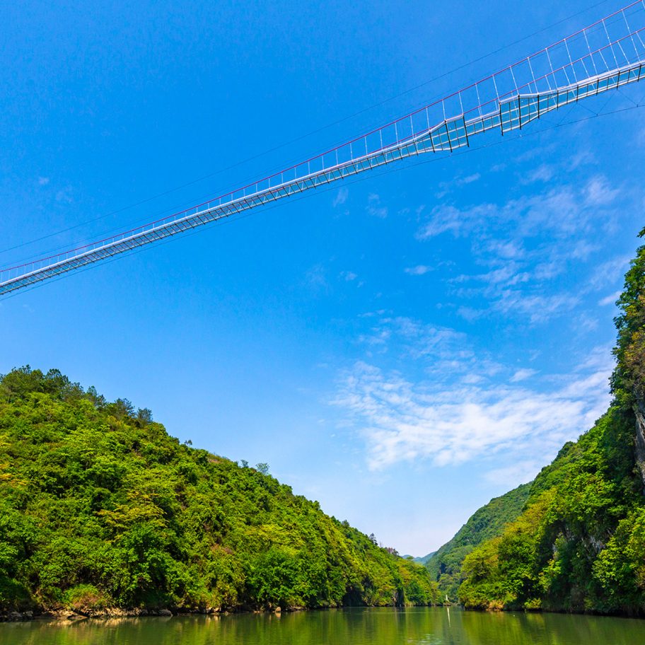 World's longest glass-bottomed bridge in Huangchuan Three Gorges Scenic Area in southern China