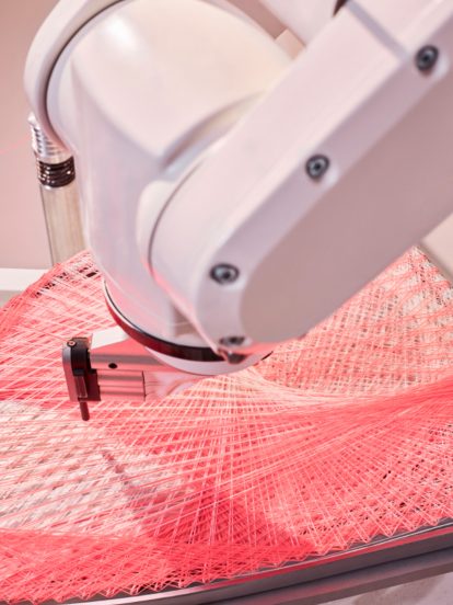 Robot weaving Adidas's Strung uppers