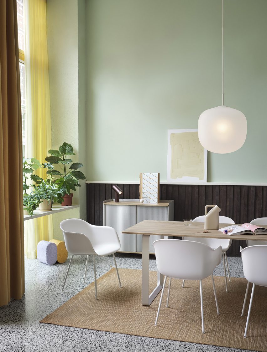 Dinning room with green walls and furniture from Finnish Design Shop