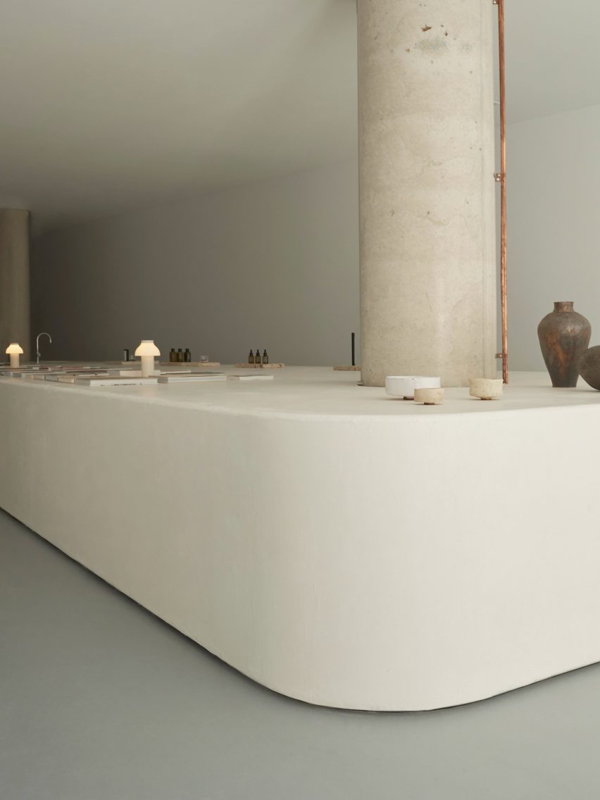 Adytum Library designed by Pattern features a huge plaster island