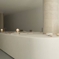 Adytum Library designed by Pattern features a huge plaster island