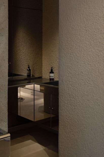 Aesop in Shinjuku features plaster walls and steel fixtures