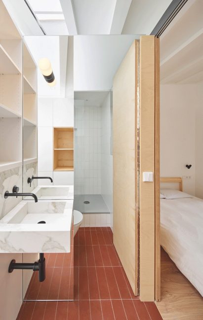 Bathroom with red floor tiles