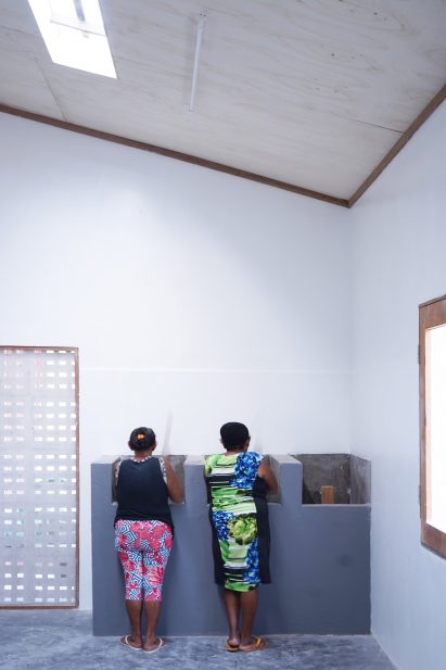 Workers at Babassu flour factory by Estudio Flume