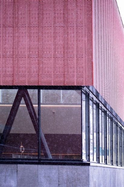 Perforated metal facade of Bølgen Bath and Leisure Centre by White Arkitekter