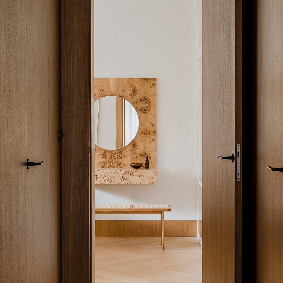Botaniczna Apartment by Agnieszka Owsiany Studio includes burl wood furniture