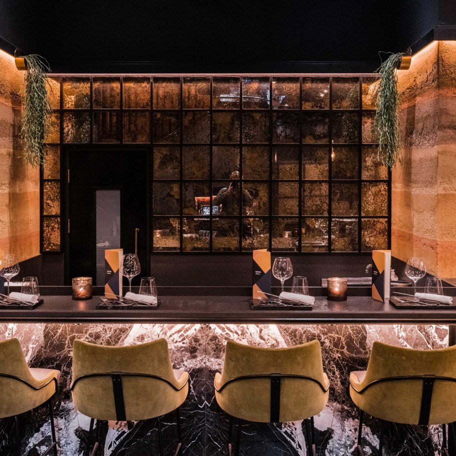 Bar with Rammed Earth Finishes clay plaster walls by Clayworks