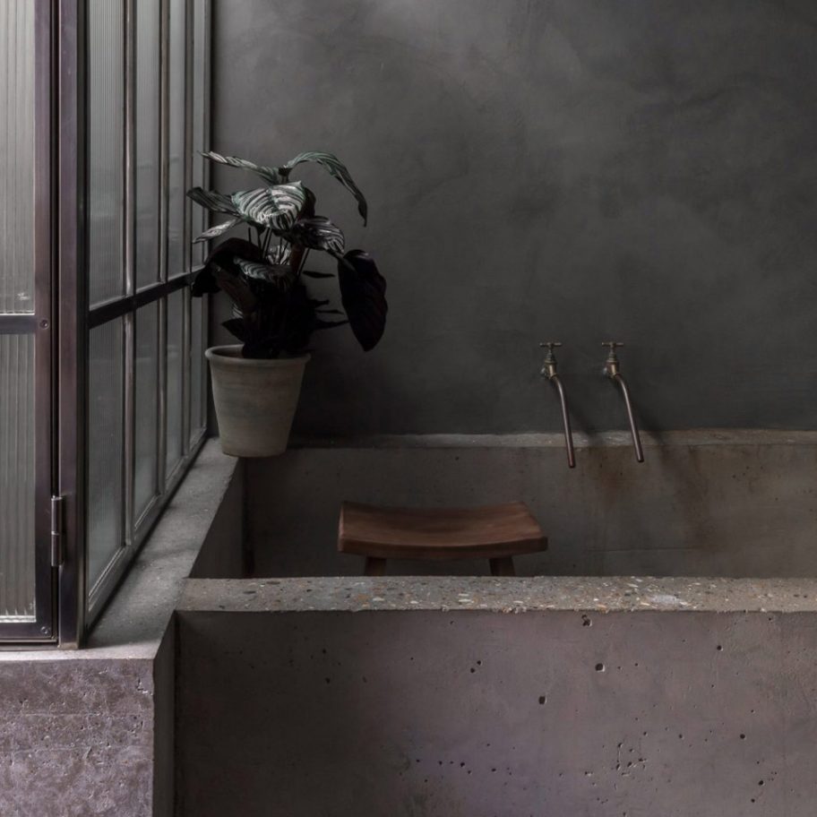 Dark bathroom inside Bathroom of Untitled House, UK, by Szczepaniak Astridge