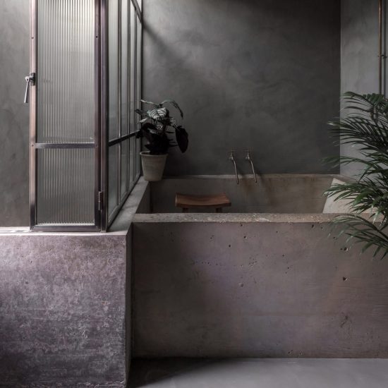 Dark bathroom inside Bathroom of Untitled House, UK, by Szczepaniak Astridge