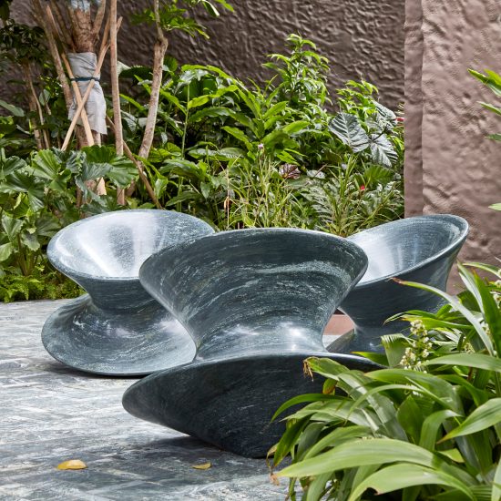 Spun chair in granite by Heatherwick Studio