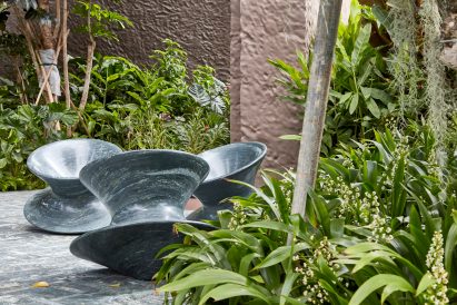 Spun chair in dark granite