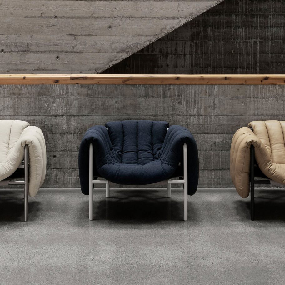 Three chairs by Faye Toogood in white, black and brown upholstery