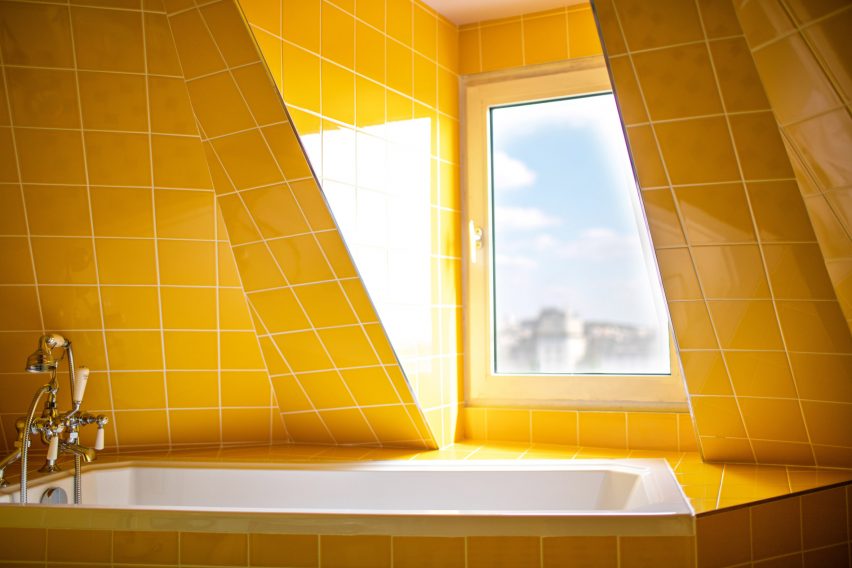 Tiled bathrooms inside Hotel Les Deux Gares in Paris